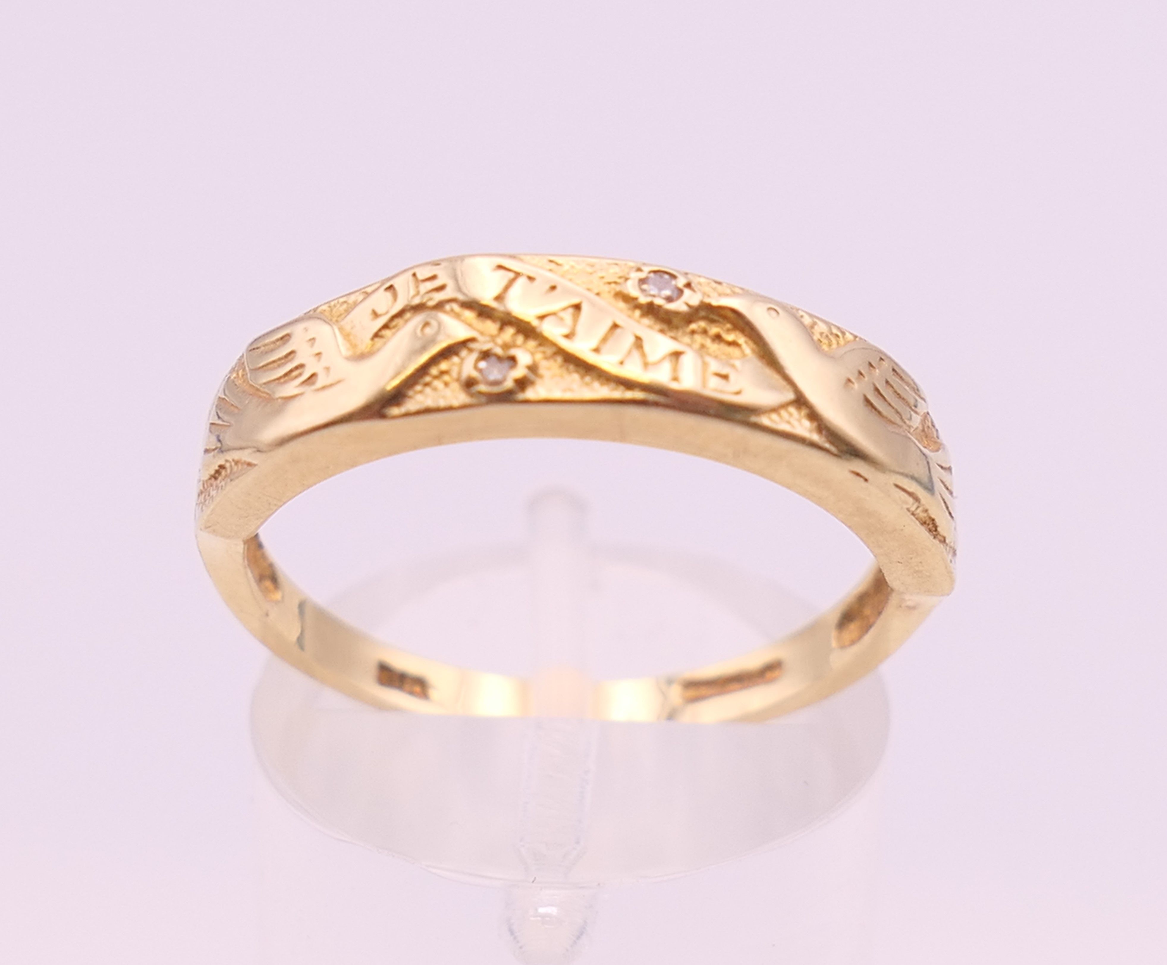 A 9 ct gold ring. Ring size Q/R. 3.8 grammes total weight.