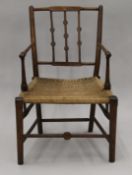 A Morris style armchair. 55 cm wide.