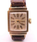 A 9 ct gold Rodania ladies wristwatch. 1.5 cm wide.