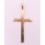 A 9 ct gold cross pendant. 4 cm high. 3.1 grammes.