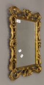 A 19th century gilt framed wall glass, with replacement mirror. 39 cm wide x 54 cm high overall.