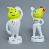 A pair of iron Esso money boxes. 24 cm high.