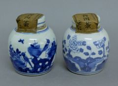 A pair of Chinese blue and white porcelain tea jars. 11 cm high.