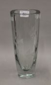 A Swedish glass vase etched with a fish. 27 cm high.