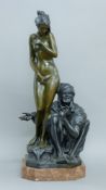 A bronze model of an Arab and a nude girl. 70 cm high.