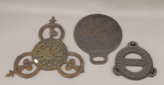A heavy cast iron steam engine plate marked The Crown Roller with crown motif,
