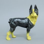 A cast iron model of a pug dog. 20 cm high.