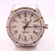 A mid-size Rolex Oyster Perpetual Date watch (dial measures 34 mm excluding crown) with white Roman