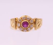 An 18 ct gold target ring. Ring size Q . 3.2 grammes total weight.