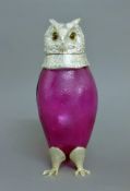 A silver plated and pink glass owl jug. 29 cm high.