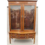 A 19th century cross banded and line inlaid mahogany display cabinet. 221 cm high x 144 cm wide.