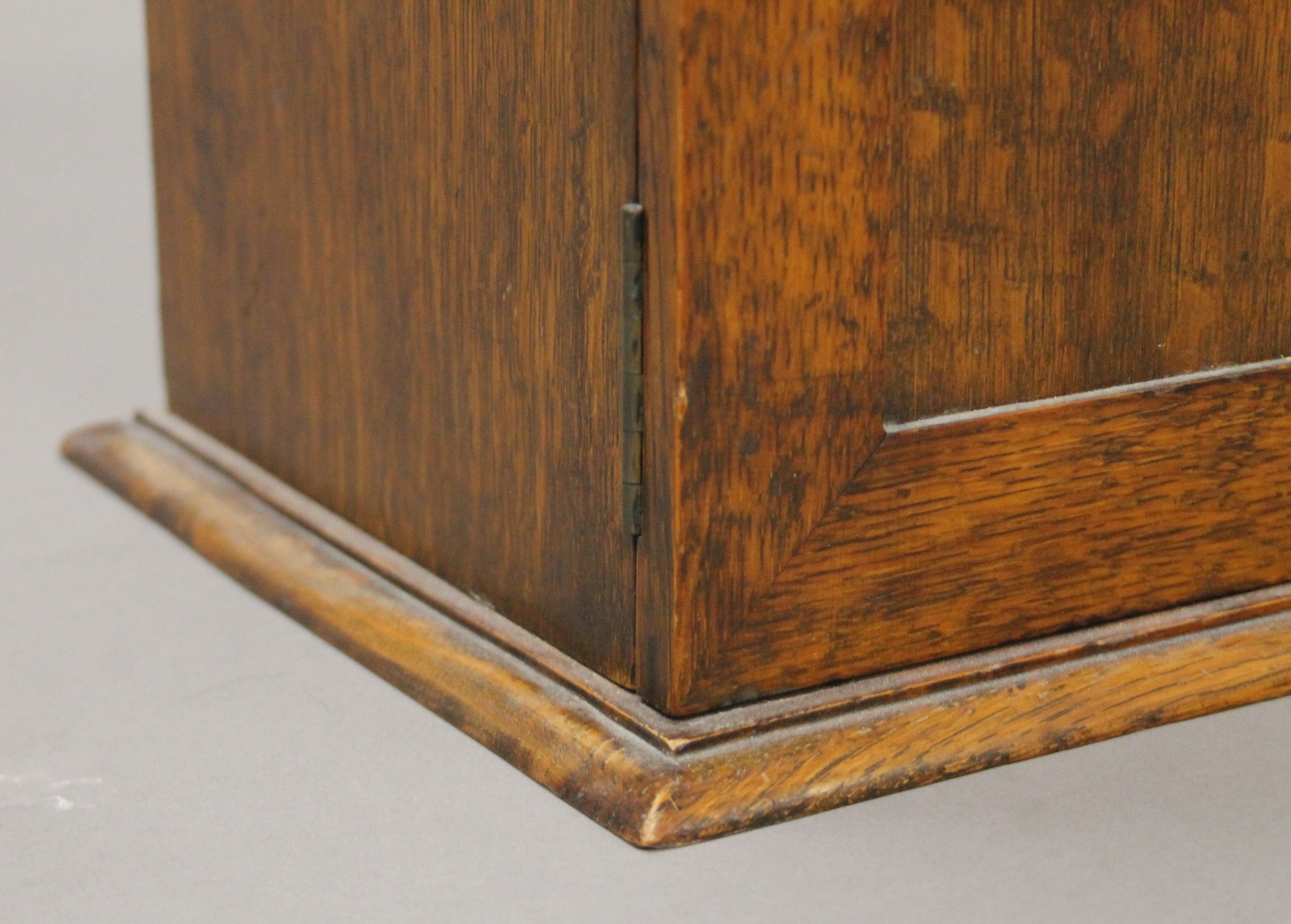 An early 20th century oak smoker's cabinet. 37 cm wide. - Image 7 of 7