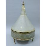 A Persian brass lidded tureen. Approximately 45 cm diameter.