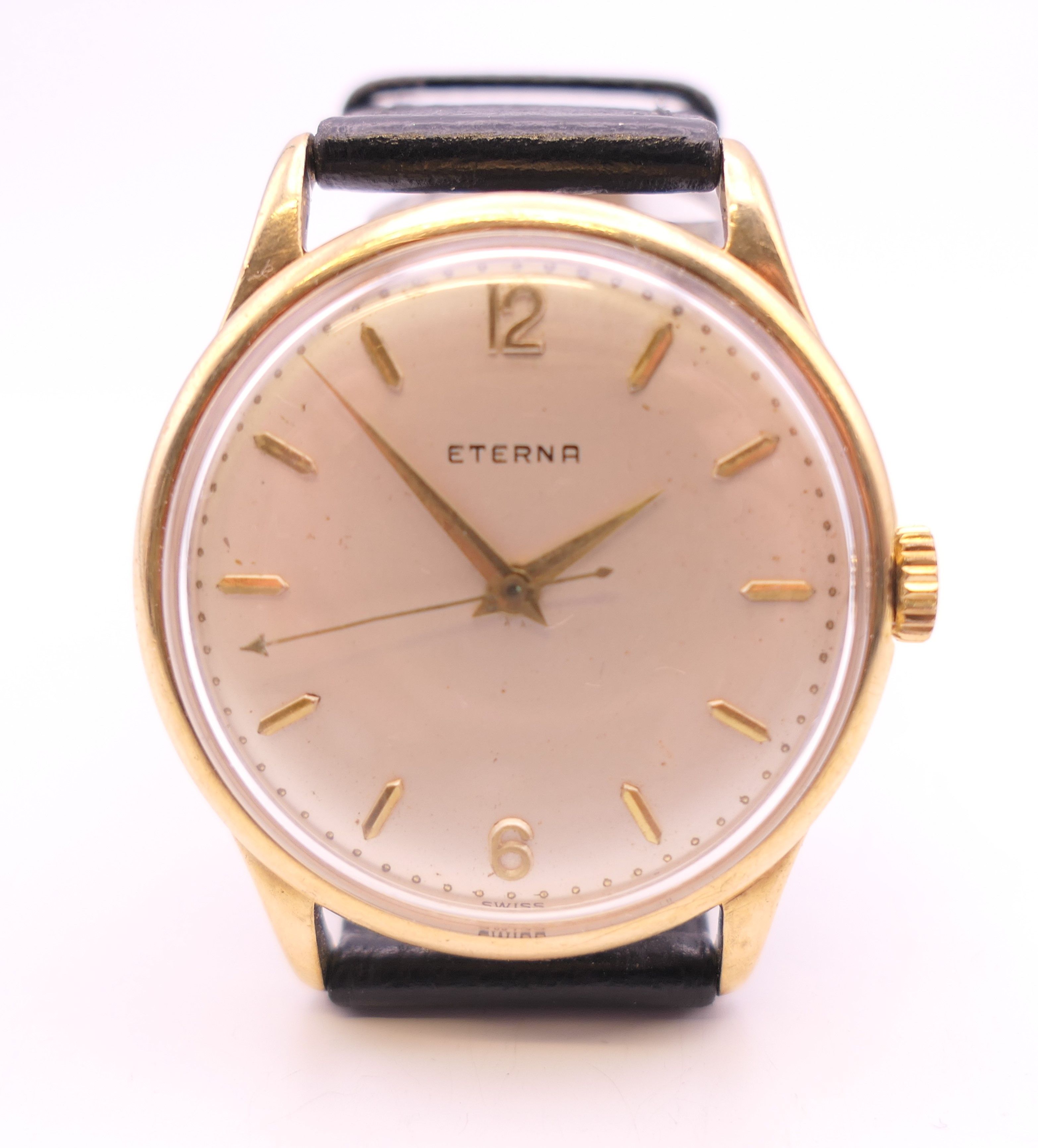 A 9 ct gold cased Eterna wristwatch inscribed to back WHL Dec 1961. 3.5 cm wide.