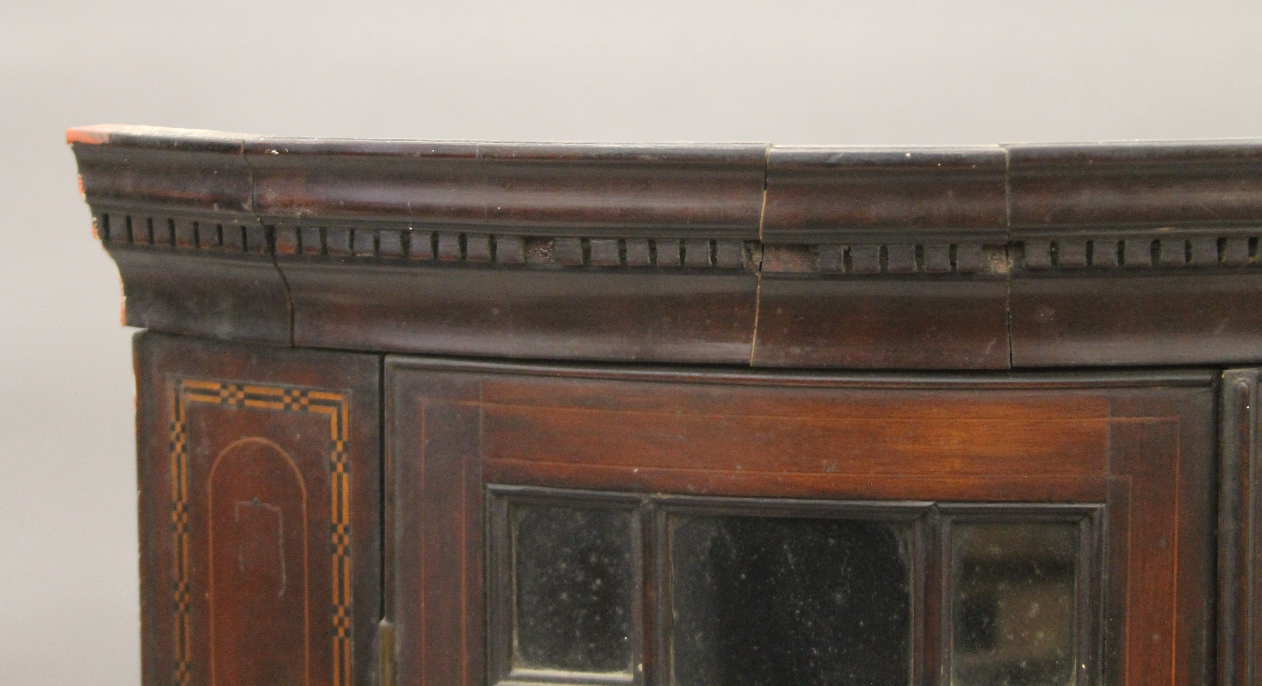 A George III inlaid mahogany glazed hanging corner cabinet. 69 cm wide. - Image 3 of 5