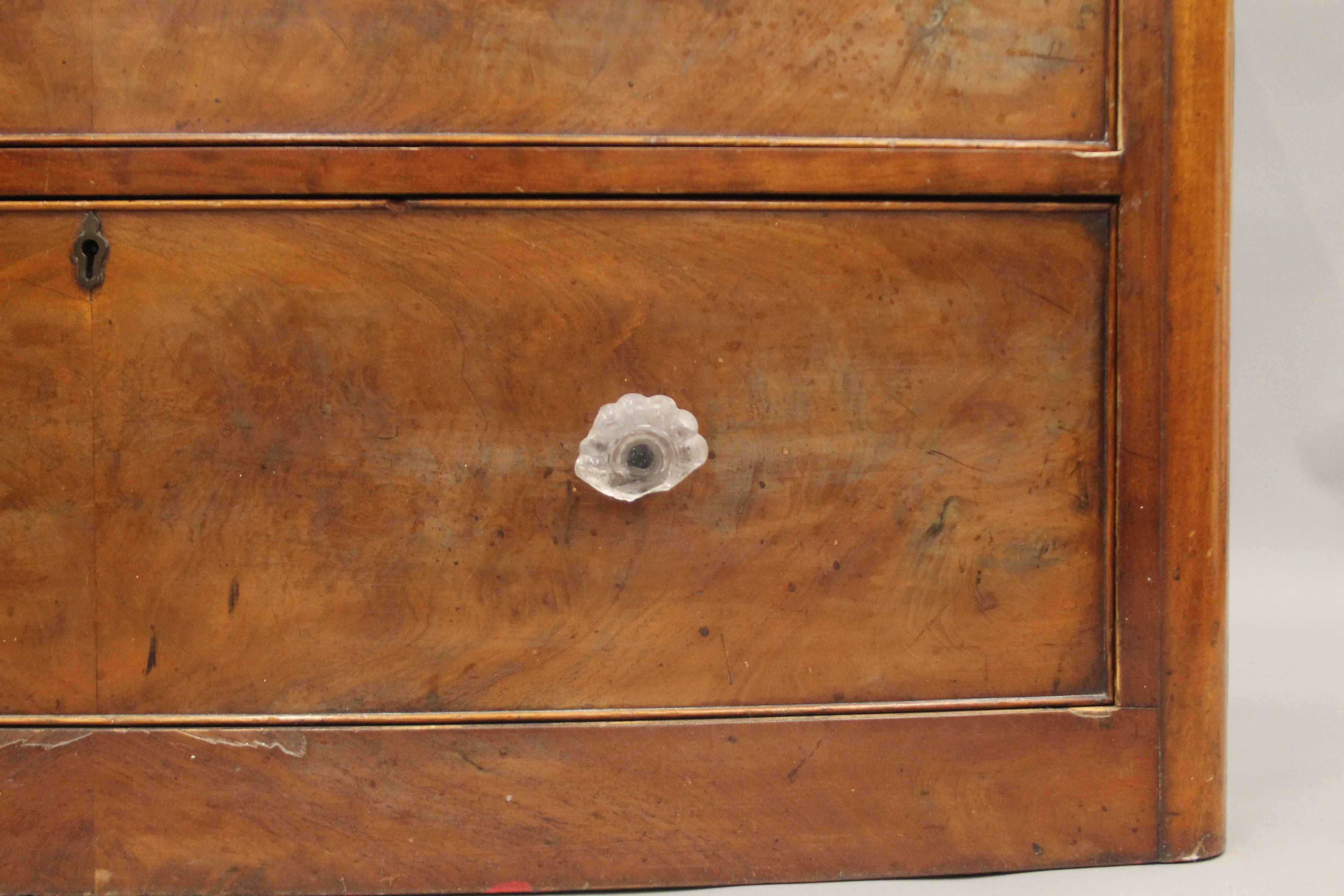 A Victorian mahogany bow front chest of drawers. - Image 9 of 9