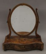 A George III mahogany dressing table mirror. 50.5 cm wide.