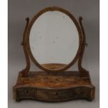 A George III mahogany dressing table mirror. 50.5 cm wide.