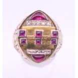 A 9 ct gold and 18 ct gold diamond and ruby ring with parts taken from top quality watches,