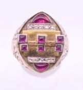A 9 ct gold and 18 ct gold diamond and ruby ring with parts taken from top quality watches,