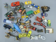A quantity of play-worn toys including Dinky, Matchbox and Corgi and a selection of vintage keys.