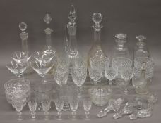 A quantity of cut clear glass drinking glasses, decanters, etc.