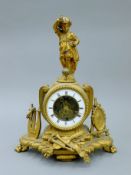 A 19th century French gilt spelter novelty mantel clock. 34.5 cm high.