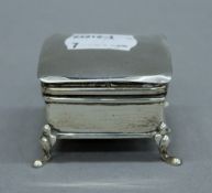 A silver trinket box. 4.5 cm wide.