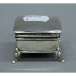 A silver trinket box. 4.5 cm wide.