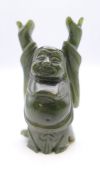 A small jade Buddha figure. 7.5 cm high.