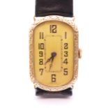 A 14 k gold cased Art Deco wristwatch. 2 cm wide. 18.9 grammes total weight.