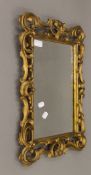 A 19th century gilt framed wall glass, with replacement mirror. 39 cm wide x 54 cm high overall.