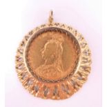 An 1891 gold sovereign in 9 ct gold mount. 3.5 cm high. 13.9 grammes total weight.