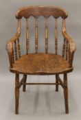 A Victorian turned stick back chair with bentwood arms. 56 cm wide.