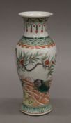 A 19th century Chinese famille verte porcelain vase. 20 cm high.