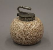 A vintage inkwell formed as a curling stone. 6 cm high.