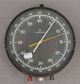 A vintage Junghans stopwatch wall clock. 20.5 cm diameter.