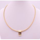 A Chopard 18 ct gold Happy Diamonds pendant necklace on a 18 ct gold wire chain,