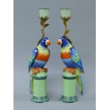 A pair of parrot form porcelain candlesticks. 31.5 cm high.