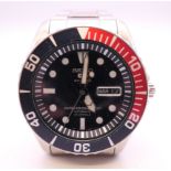 A gentleman's Seiko 5 Sports wristwatch. 4.5 cm wide.