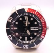 A gentleman's Seiko 5 Sports wristwatch. 4.5 cm wide.