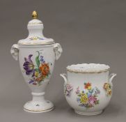 A Dresden jardiniere and a Belgian lidded porcelain vase. The latter 38 cm high.