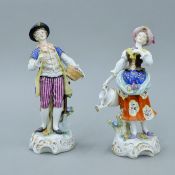 A 19th century pair of Paris porcelain figures of gardeners. The largest 19.5 cm high.