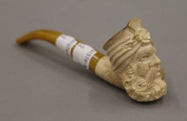 A Meerschaum pipe with an amber mouthpiece. 14 cm long.