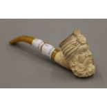 A Meerschaum pipe with an amber mouthpiece. 14 cm long.