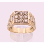 A 9 ct gold gentleman's ring. Ring size V. 7.3 grammes total weight.