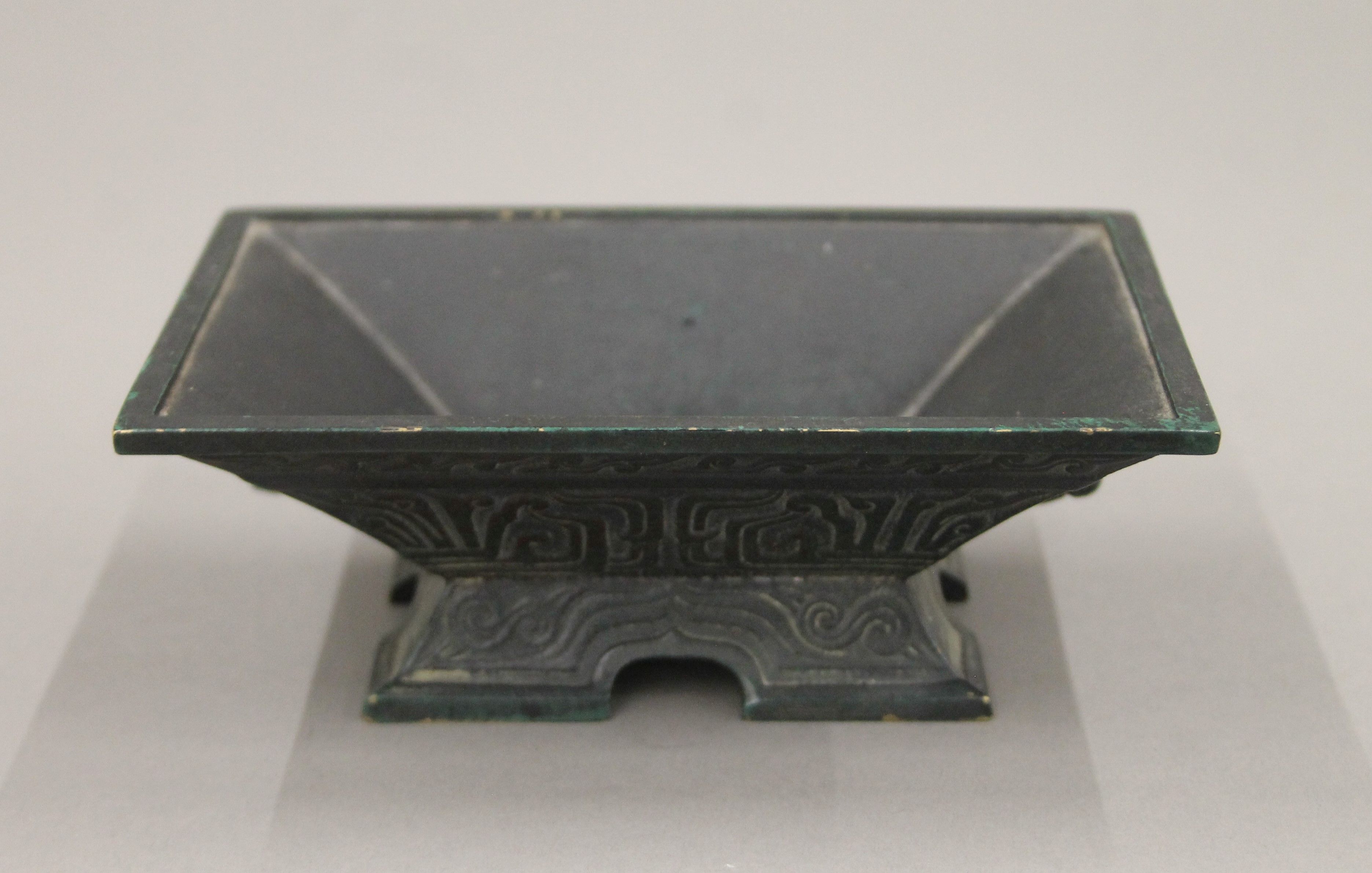 A Chinese patinated bronze censer. 13 cm wide.