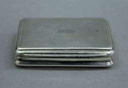 A Georgian silver snuff box. 6.5 cm wide. 55.9 grammes.