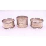Three silver napkin rings. Largest 3.5 cm high. 98.9 grammes.