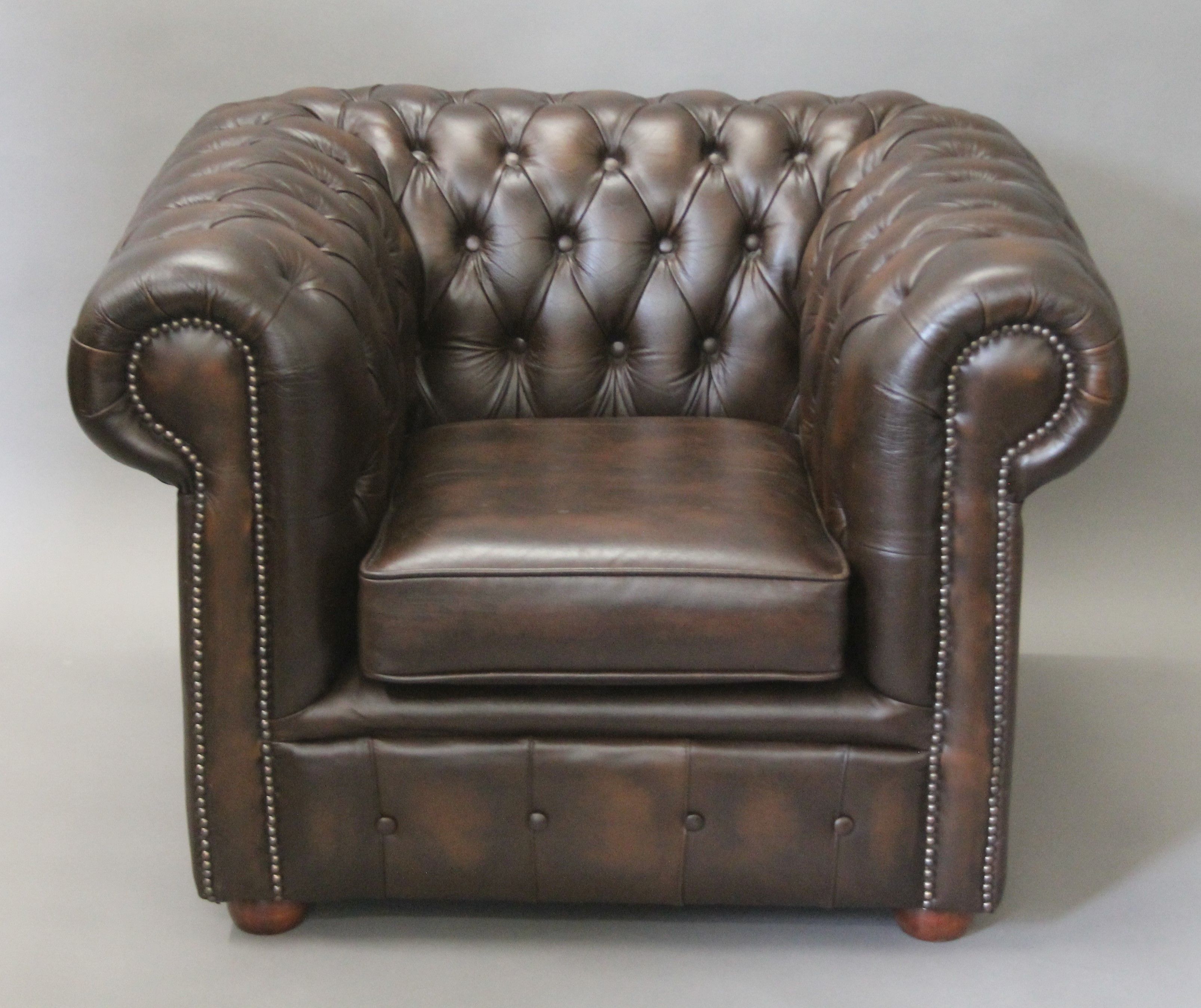 A Chesterfield type armchair. 98 cm wide.
